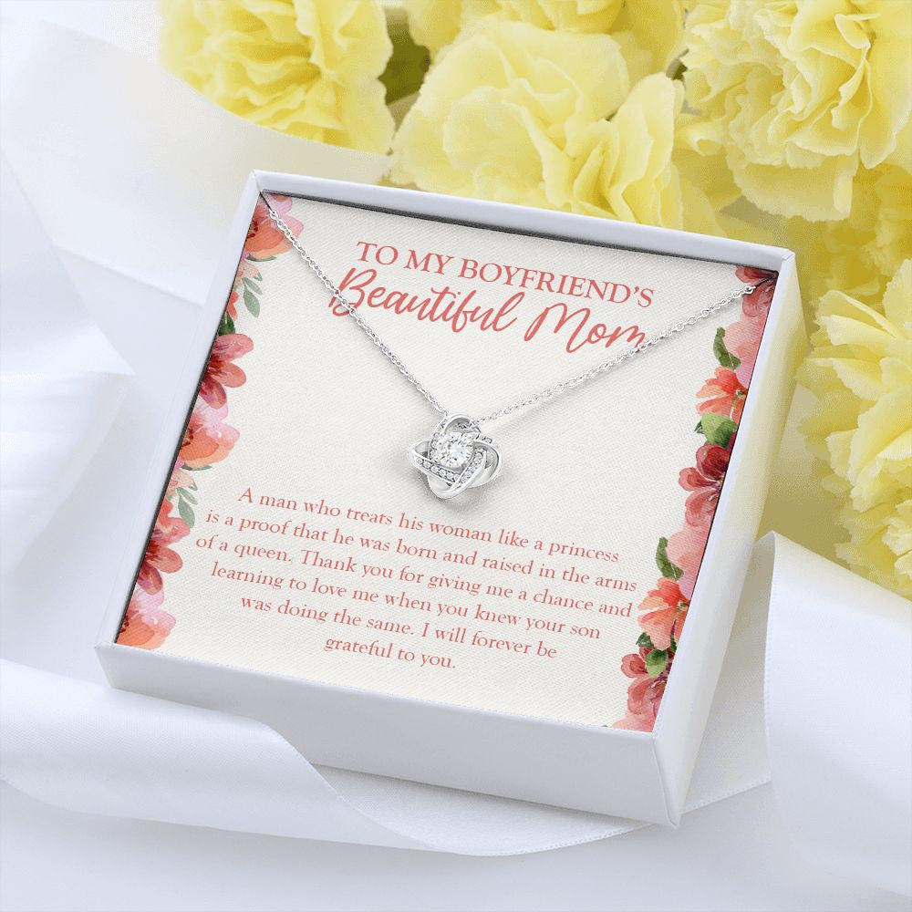 Raised in the Arms of the Queen love knot pendant yellow flower