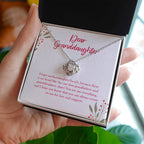Count Me For Love And Support love knot necklace in hand