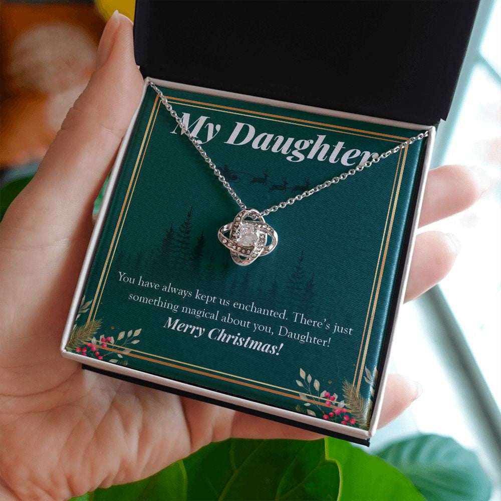 Kept Us Enchanted love knot necklace in hand
