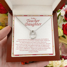 Load image into Gallery viewer, Juggle A Classroom horseshoe necklace luxury led box hand holding
