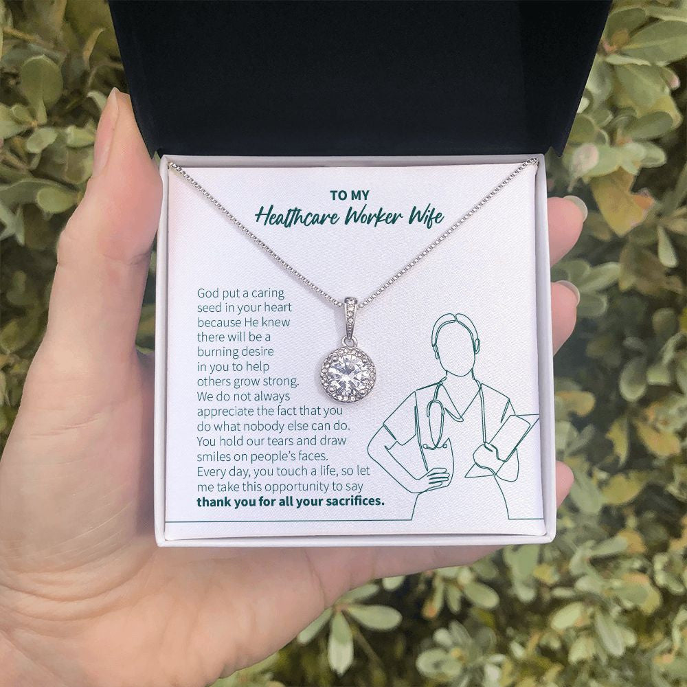 Caring Seed In Your Heart eternal hope necklace in hand