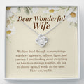 Lived Through Together love knot necklace front