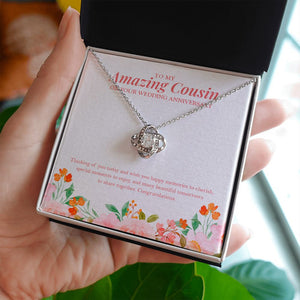 Happy Memories to Cherish love knot necklace in hand