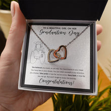 Load image into Gallery viewer, Direction you Choose interlocking heart necklace in hand
