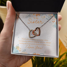 Load image into Gallery viewer, My Human Diary interlocking heart necklace in hand
