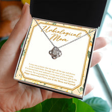 Load image into Gallery viewer, Most Precious Gift love knot necklace in hand
