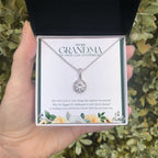 One More Happy Life Together eternal hope necklace in hand