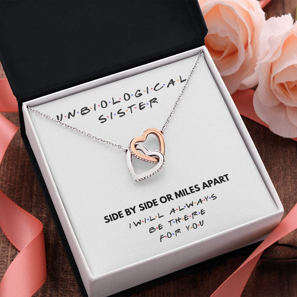 Side By Side interlocking heart pendant pink flower
