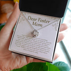 Everything You've Done love knot necklace in hand